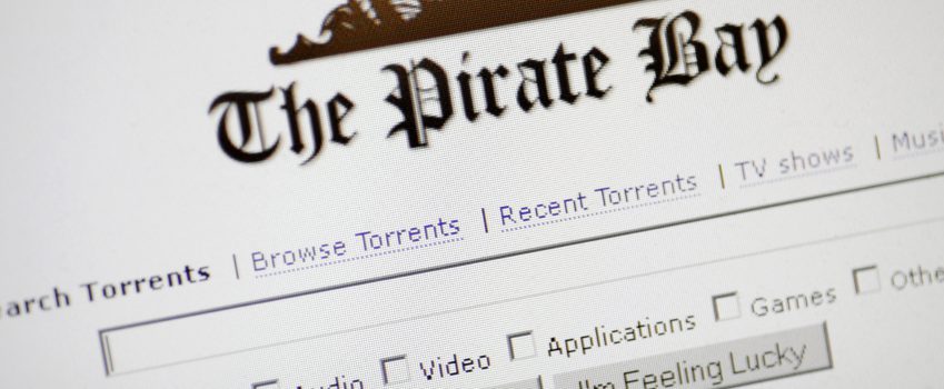 Bucharest, Romania - January 10, 2012: The Pirate Bay website main page is displayed on a computer screen. The Pirate Bay is a Swedish website which hosts magnet links and .torrent files.